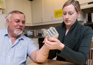 Frank Hrabanek works with occupational therapist Hannah Hega in Toronto, Dec.2, 2009.