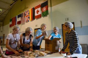 In one day, Mount Mourne eighth-graders assembled and packed 21,000 nutritious meal packets for shipment to Azerbaijan. (jsimmons@charlotteobserver.com)