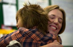 Teacher Carrie Gelson gets a hug from student Deandra at Vancouver's Seymour Elementary. Photograph by: Ward Perrin, PNG  