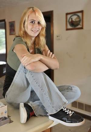 Whitney Kropp, a free spirit with few friends, was named to the homecoming court as a joke by her classmates, but the tiny farm town of West Branch has rallied around her. (Dale G. Young / The Detroit News) 